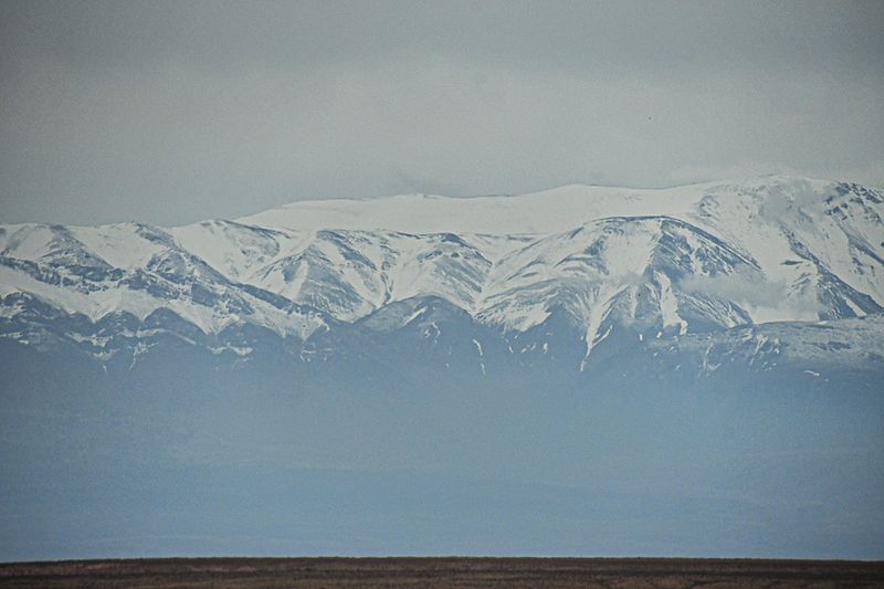04 02 Atlas Mountains looming over a barren landscape Moroc-4032