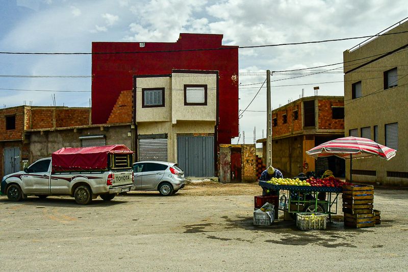 04 02 04 02 Produce vender in a small town along the way Moroc-4062