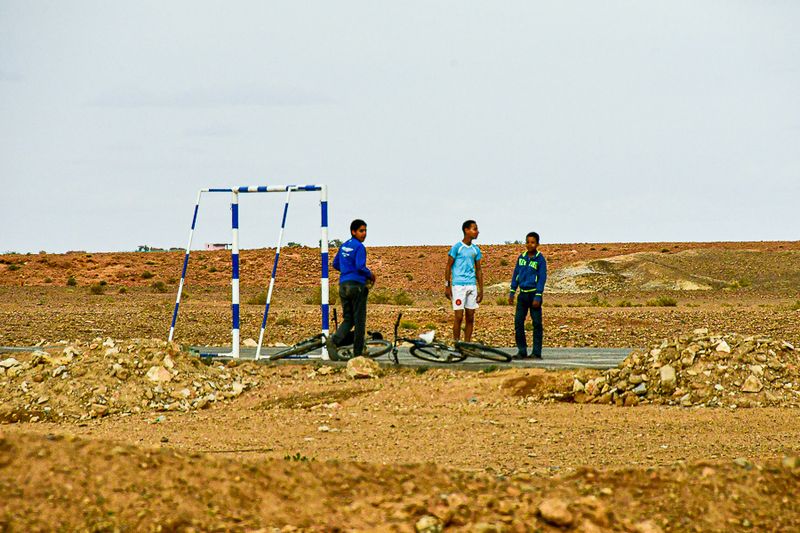 04 02 Three boys on a soccer field that was pretty far from anything else Moroc-4263