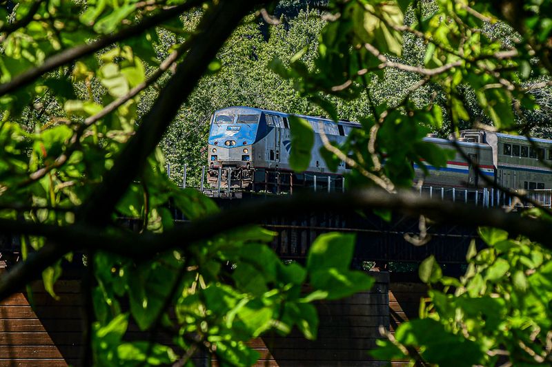 09 03 AmTrak train leaving Harper's Ferry station and crossing the Potomac River 9387
