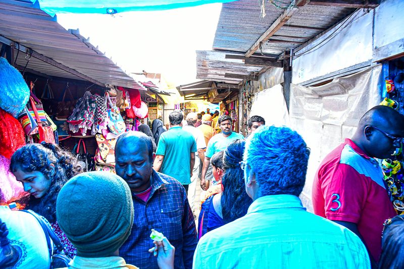 2017 09 07 Crowded lane under blue tarp light - 'Kodai' India-2-4046