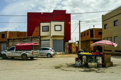 04 02 04 02 Produce vender in a small town along the way Moroc-4062