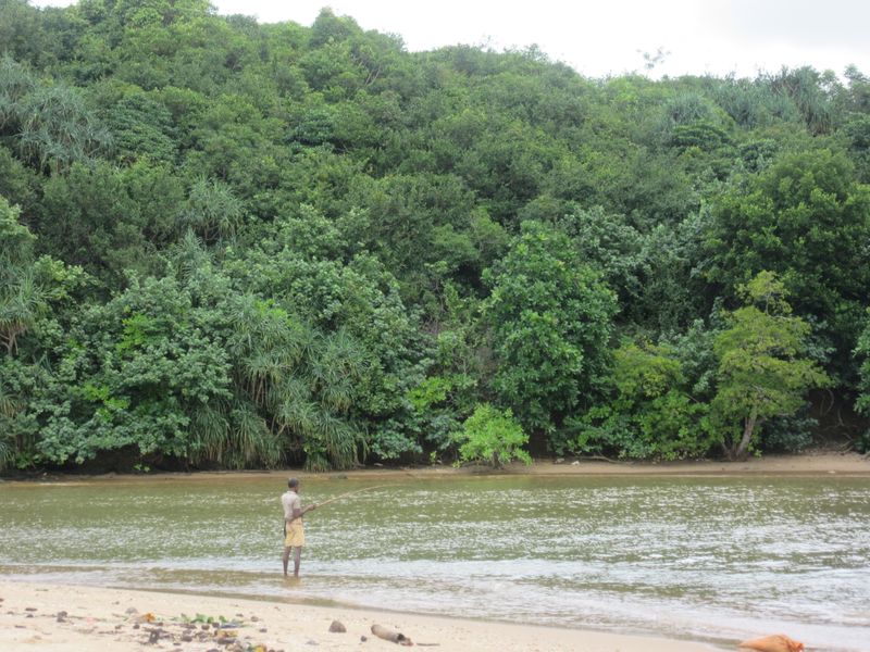 A fisherman on the river