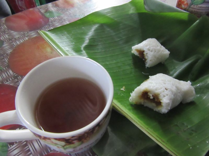 Lovely cuppa and a delicious string hopper rolled with coconut and sugar