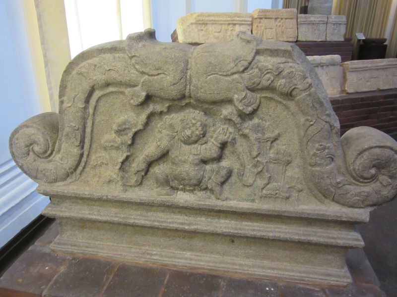 Urinal stone and an upper stone 7th - 8th century CE