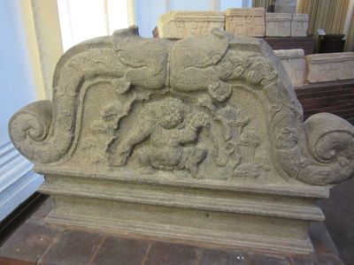 Urinal stone and an upper stone 7th - 8th century CE