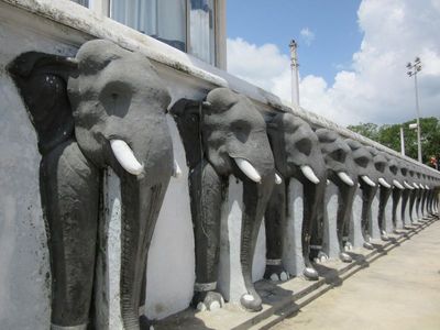 Guarded by a wall with a frieze of...