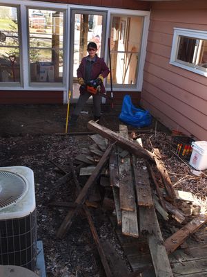 Spring 2020...Pulling up the rotted wood walkway into back yard.