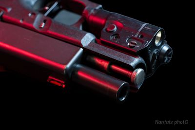 An handgun with a laser sight