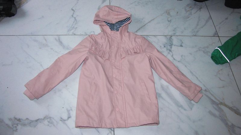 122-128 HEMA regenjas roezeljas roze  16,50