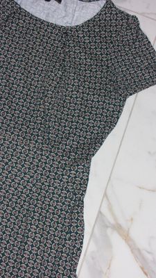 40 KING LOUIE jurk detail