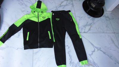 176 BLACK BANANAS trainingspak zwart geel 48,50
