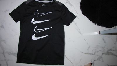 146-152 NIKE running shirt 12,00