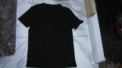 small ASOS shirt met zon achterop 11,00