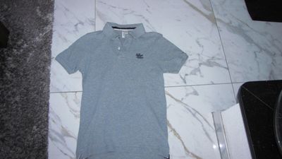 small-medium TOMMY HILFIGER grijs polo 17,00