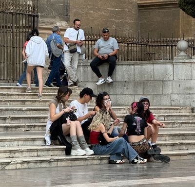 Taking a break on the steps of the Cathedral