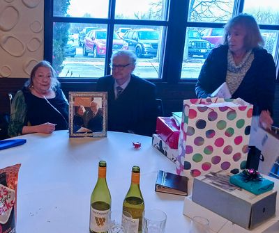 Mary and John  with guest opening gifts