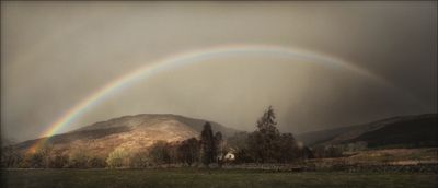 Rainbow over Drumbeg cottage, Kinlocheil, Inverness-shire.
