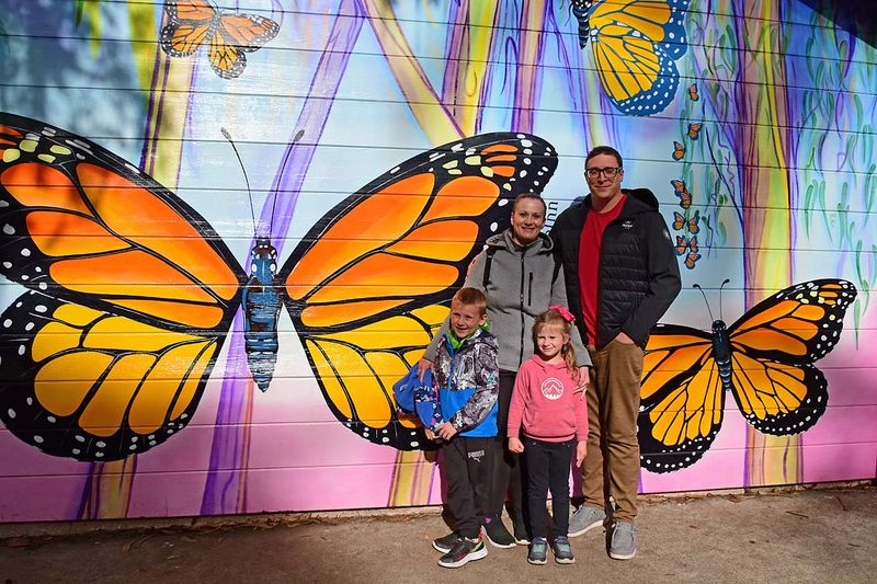 Family By The Mural