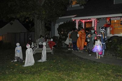 Spirits, Bench, and Trick-or-Treaters