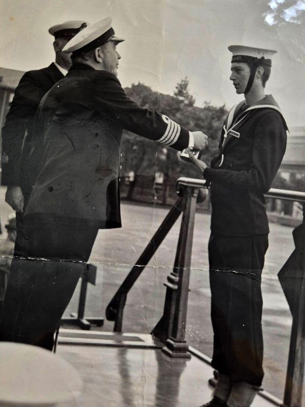 1975 - BRIAN SKELLEY, 87 RECR. BEING PRESENTED WITH BEST SHOT TANKARD.jpg