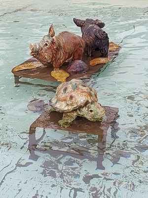 colourful ceramic creatures in the water