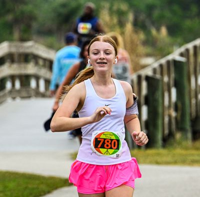 -Tin grins are in-   5K Run