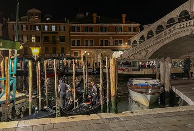 Gondoliers at the Rialto Bridge