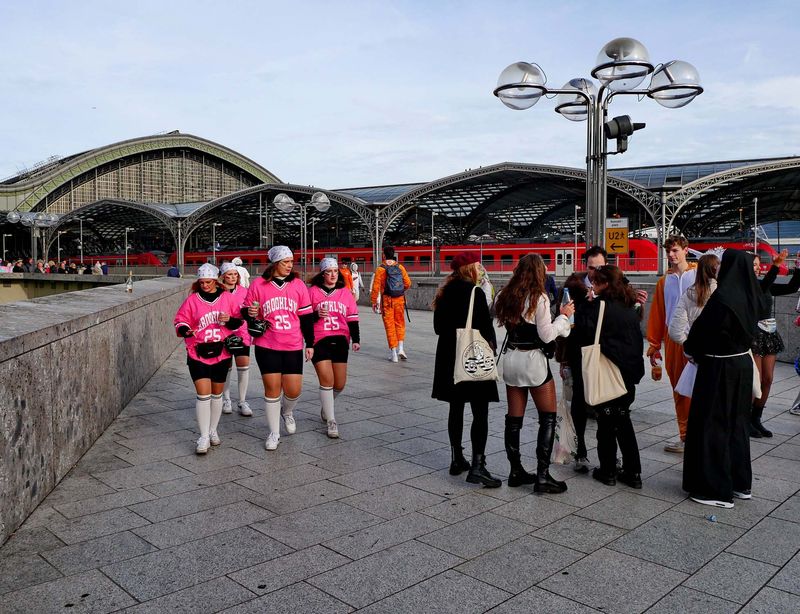 Koln: carnival people near the train central station.  