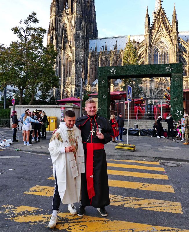 Koln: costumed carnival people.