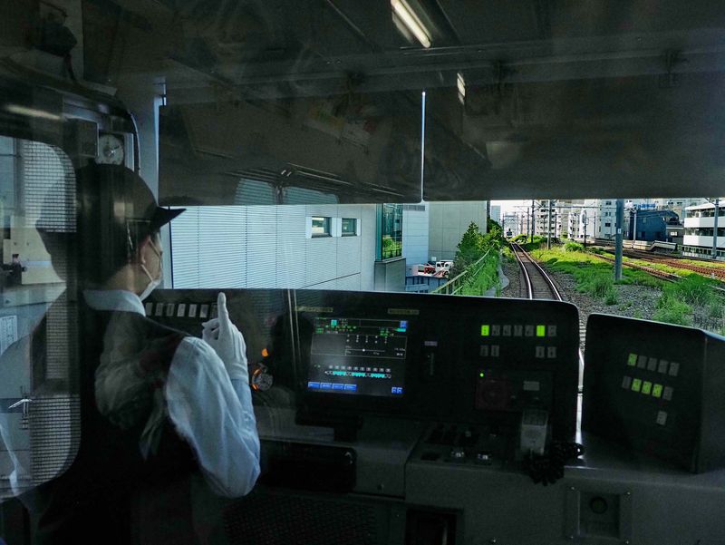 The train conductor has to make signs now and then (certainly to verify that they are alert). 