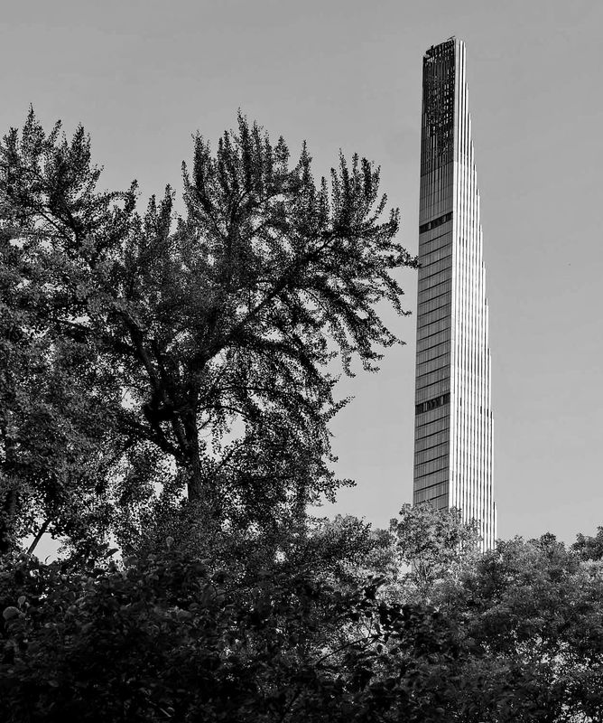 A new skyscraper, seen from the Central Park.