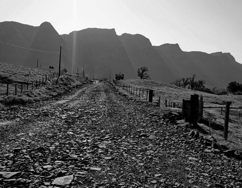 In some parts, the road is muddy and rocky; hard to drive and tough to cars. 
