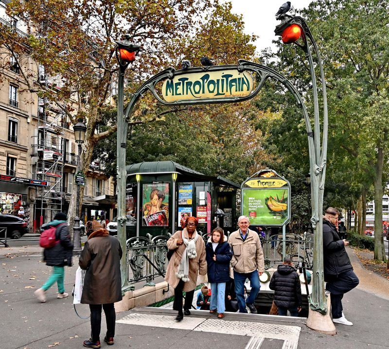 Pigalle subway station; my friend Fahd is arriving with a smile. 
