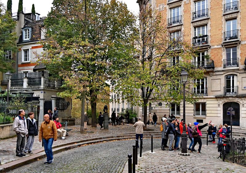 Place Dalida; a well known french singer, who commited suicide in the 1980s. 