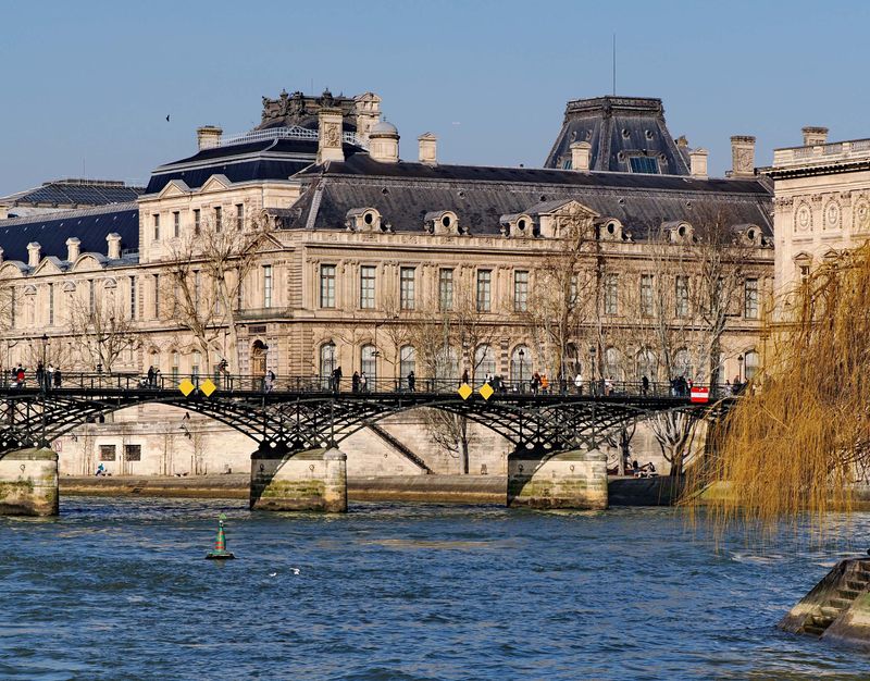 Bateau Mouche tour: the Pont des Arts and the Louvre.