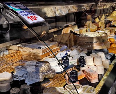Des fromages at the market of Boulevard Richard Lenoir. 