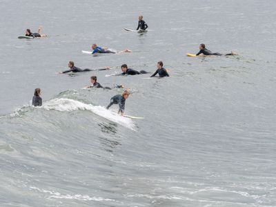 surfers near raglan