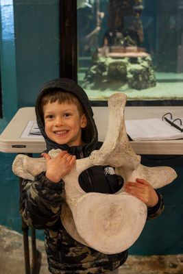 Charles and a blue whale vertebra