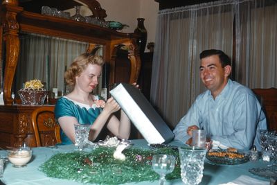 JoanneTed in Meemo's dining room, Easter, 1957?