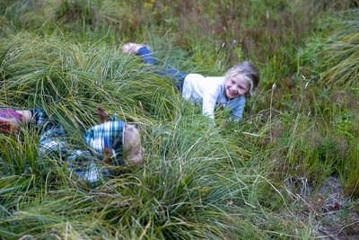 Margaret and Dorothy romping in the meadow
