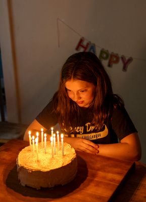 Admiring her cake