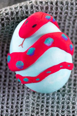 Egg engulfed by a snake