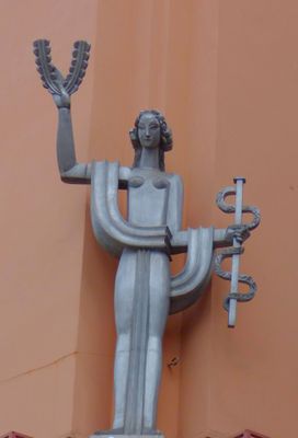 Modern statuette corner of St John with Main Market Square