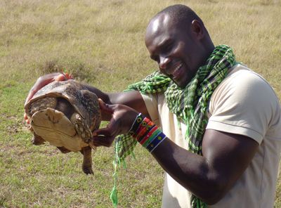 Guide John with Leopard Tortoise