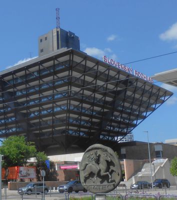 Slovak Radio building with Biatec coin monument