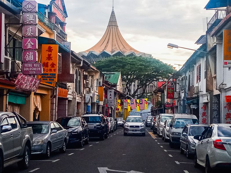 Upper China Street, Chinatown, Kuching with State Assembly (across the river) in the distance