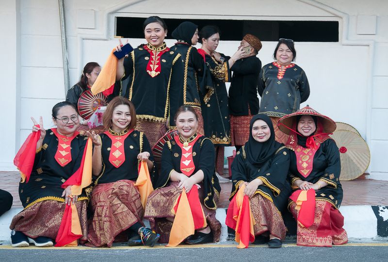 Dancers wearing ethnic costumes on Merdaka (Freedom) Day in , Kuching, Sarawak, Malaysia