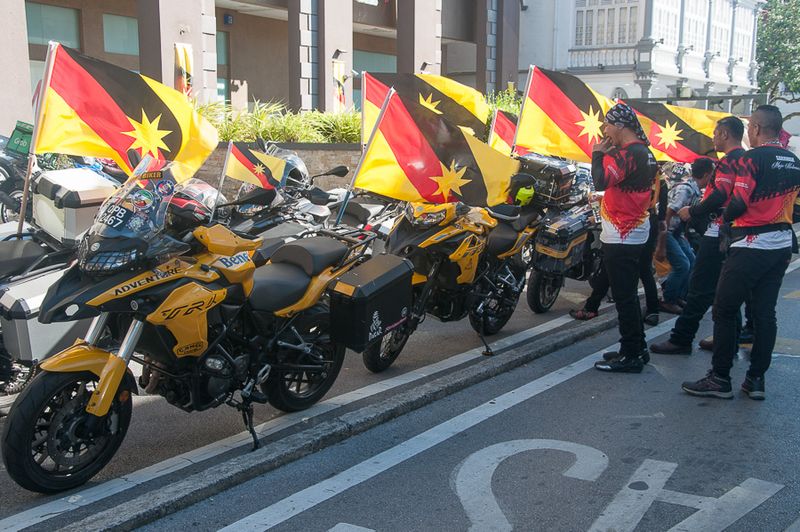 Motorcycle convoy preparing to depart Kuching, riding across Sarawak to celebrate the state's 60th Freedom Day 