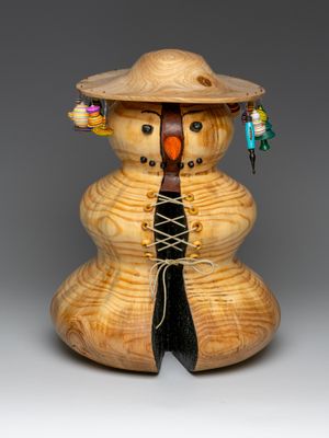 I made this 'snow person' from pine and other woods. 14 H x 13 dia.